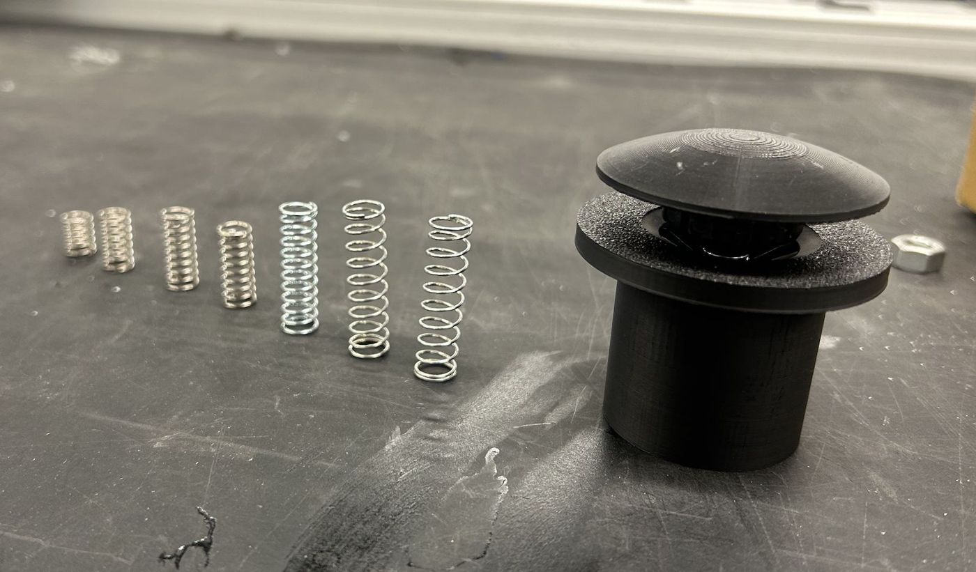 Row of springs next to the prototype